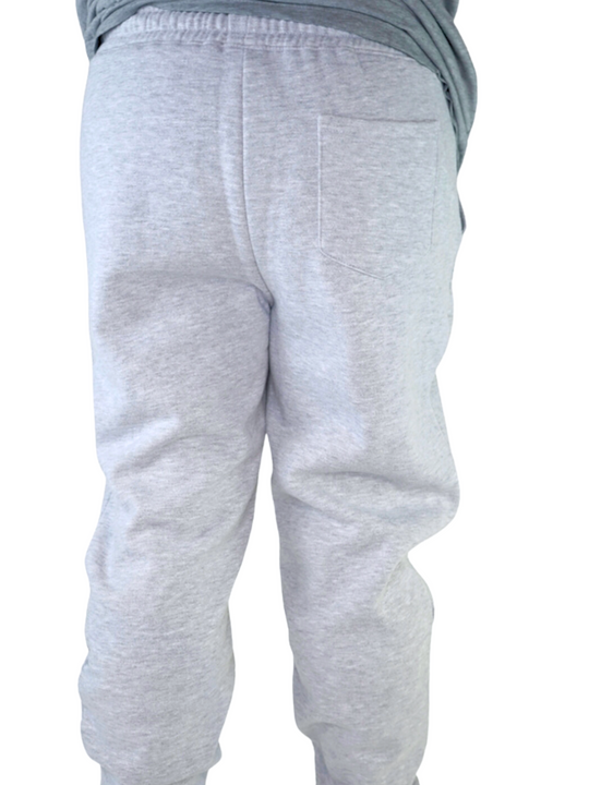 Experience the ultimate comfort in Men's joggers with GODinme! Made with premium quality fabric, these Grey GODinme sweat pants offer an elastic waistband for that perfectly relaxed fit. Featuring ribbing ankle cuffs, sewn eyelets, and the signature GODinme logo at left leg.