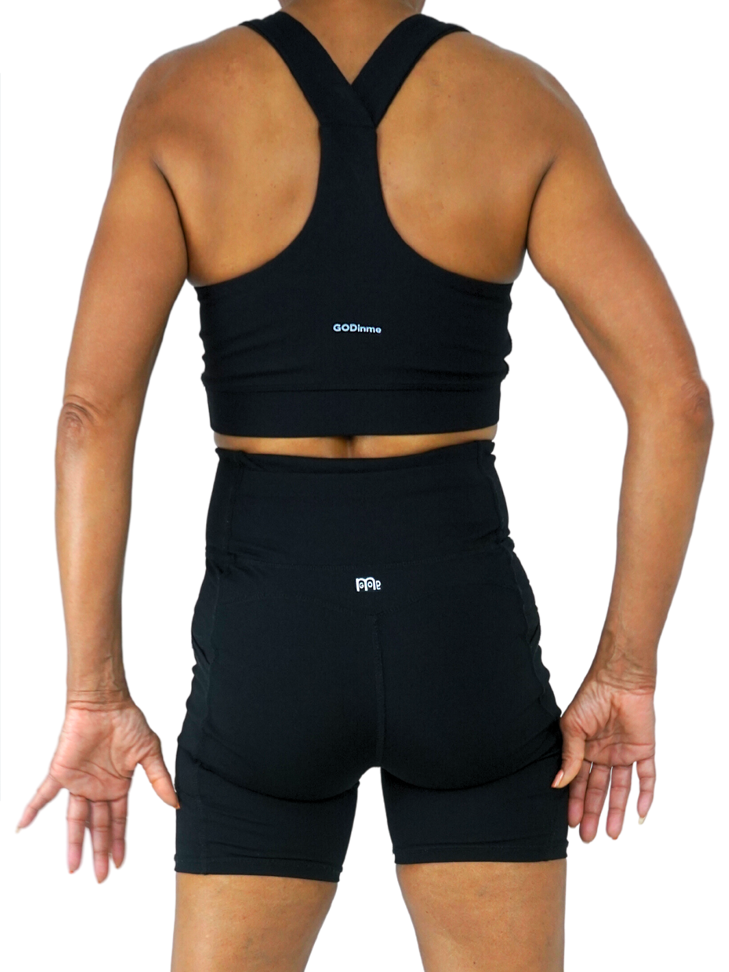 Black sports/workout bra with classic front straps and logo printed on left; Y-Back racer design for maximum support (Godinme printed in center); removable pads, moisture-wicking fabric for added comfort, and four-way stretch allowing for full range of motion.