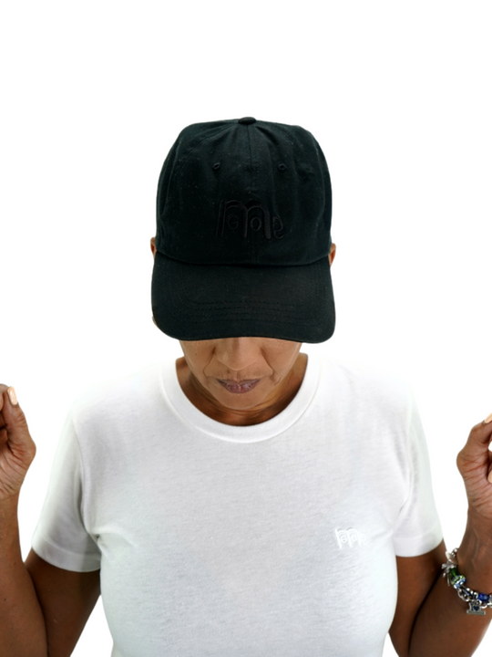 The forever popular Black 6 panel unstructured Dad Hat has Black curved under visor and antique Brass buckle closure. Embroidered in Black is the GODinme Logo on front and GODinme name on left side.