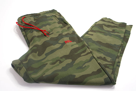 Experience ultimate comfort and style in the Men's GODinme Green Camouflage SweatPants from our Romans 12:21 Collection. Featuring the iconic Red GODinme logo, Red shoestring draw cord, and sewn fly details; its time to elevate your faith with these must-have joggers.