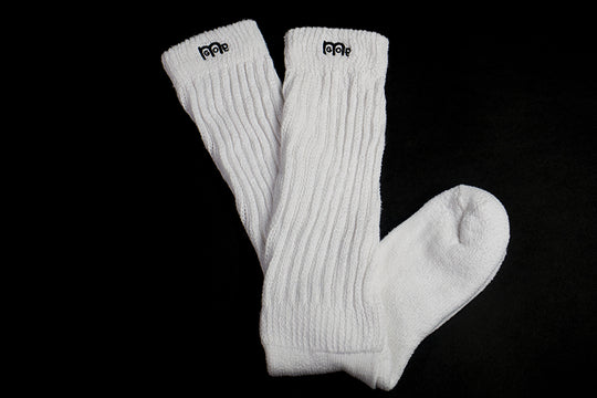 White slouch socks with Black logo