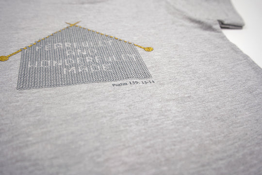 Grey Toddler T-Shirt with "Fearfully and Wonderfully Made" printed on front and woven GODinme logo tag sewn at bottom left